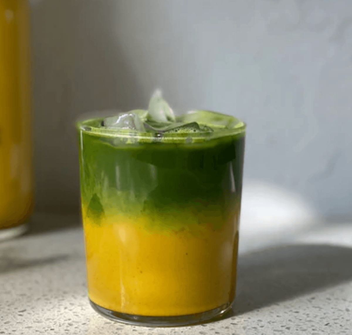 Golden Turmeric Oat Iced Matcha Latte - Nuthatch